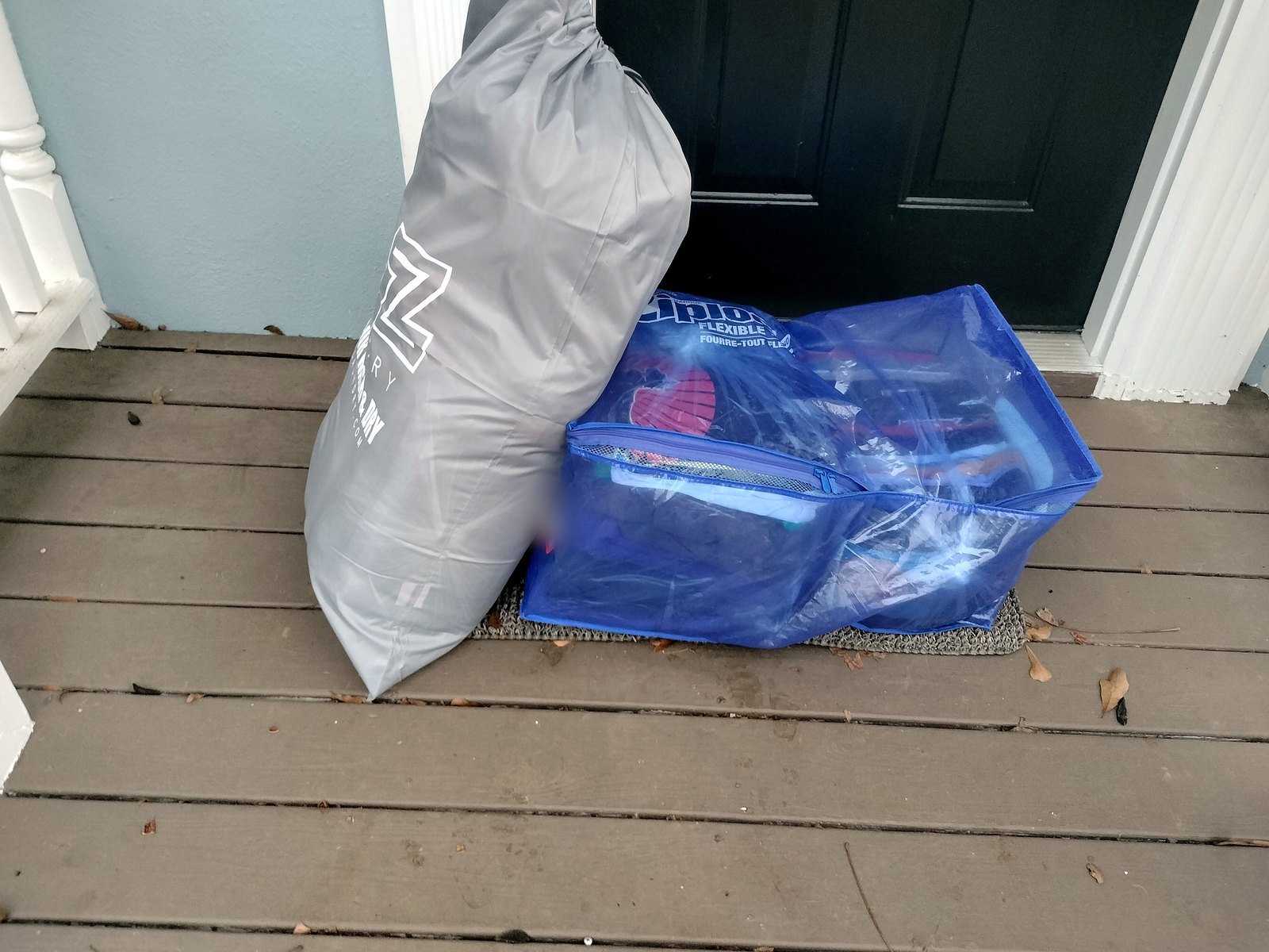 Folded laundry bagged and returned to a customer's front door
